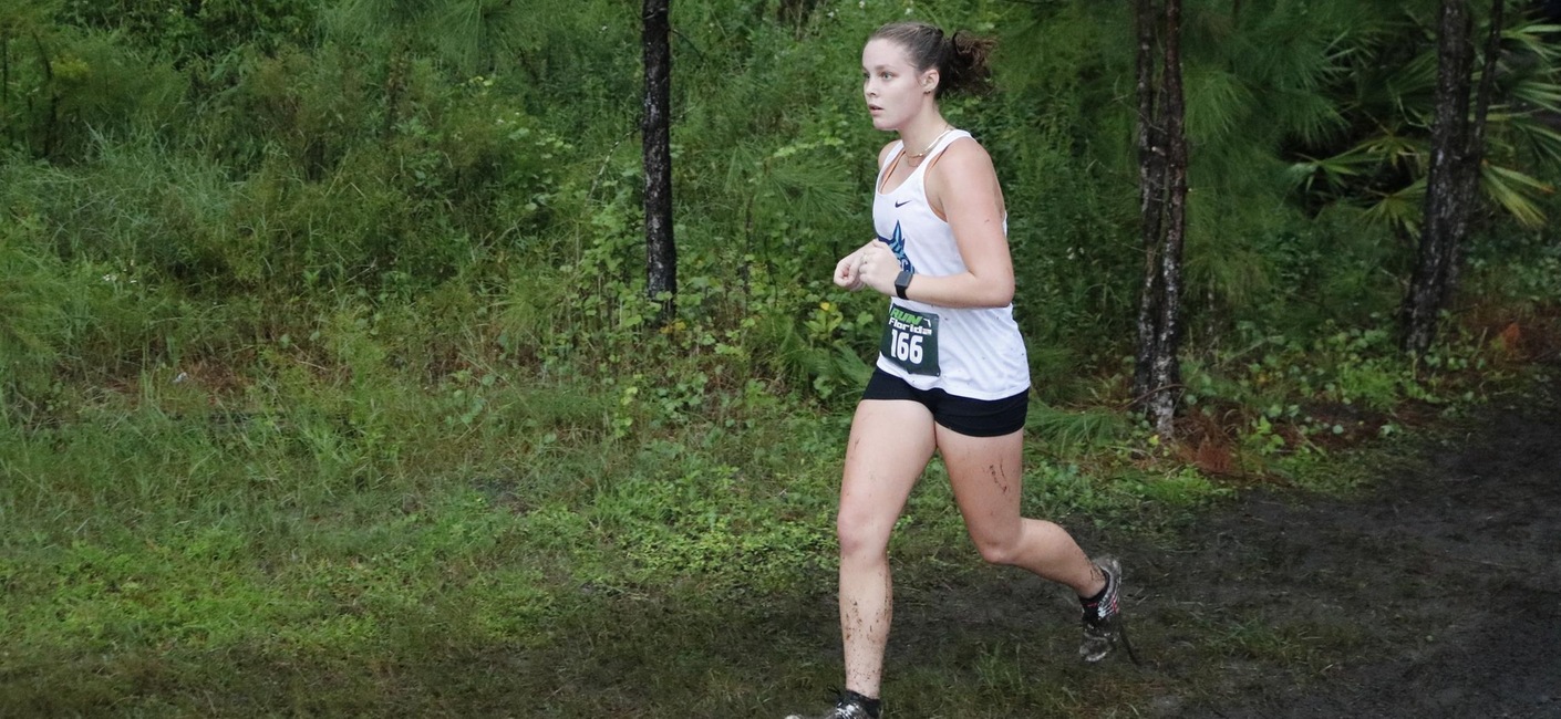 Picture of Lauren Hughes running and setting a personal best time